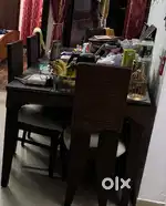 Glass Dining table including  Six chairs with excellent condition