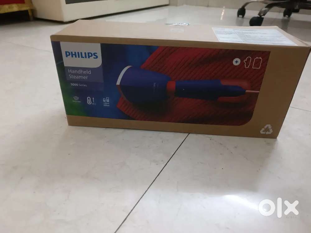 Brand new philips handheld steamer