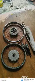 Royal Enfield Spoke Rings, Back Shokup, and New shot silencer sealed