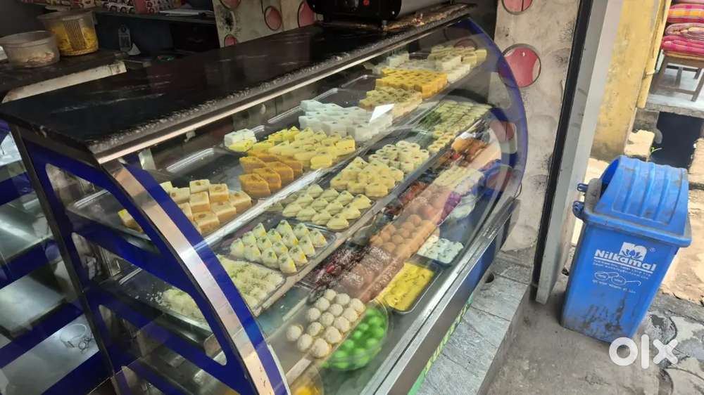 Sweet shop cake pastry display counter showcase 9 month old running