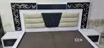 Bed with side table