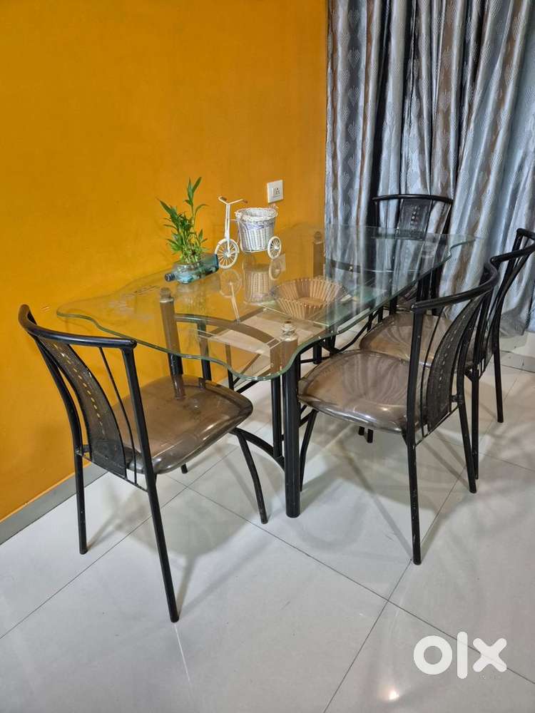 Glass dining table with 4 chair