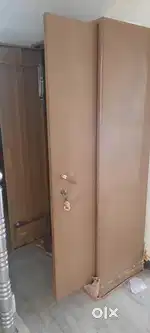 1 Steel Almirah  1 Teak Wood Storage Box