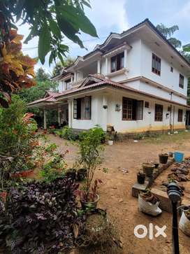 30 cents land with 2500 sqft house with 5 bedrooms, 4 bathrooms