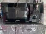 Brand New 21L Convection Microwave with AutoCook