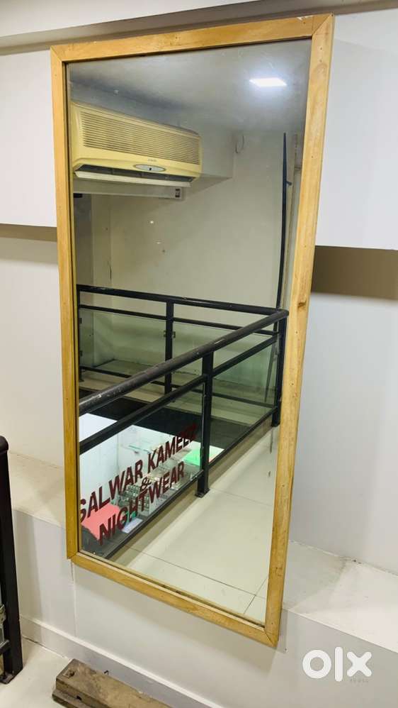 Mirror with wooden frame