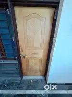 Wooden Door and window shutters. Modular kitchen setof cabinets,basket