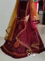 Unused Semi stitched maroon colour bridal lehenga with 2 dupattas