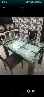 Glass Top dining table with 4 chairs , Very good condition