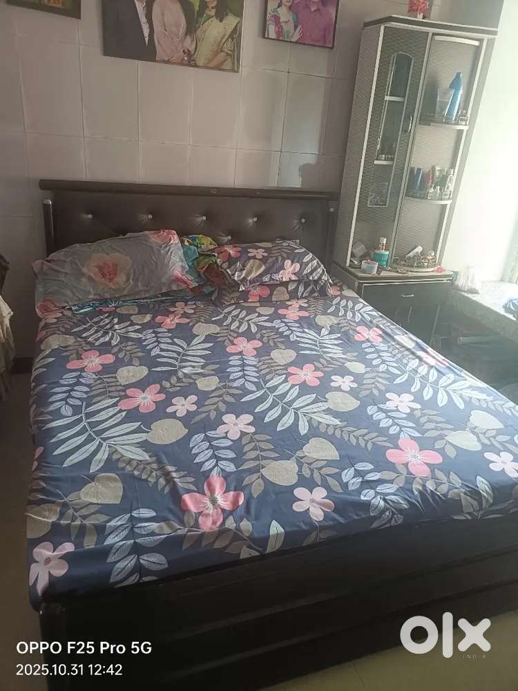 Iron bed in good condition with storage