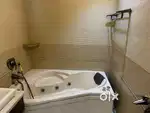 Bathtub with Jacuzzi and fittings