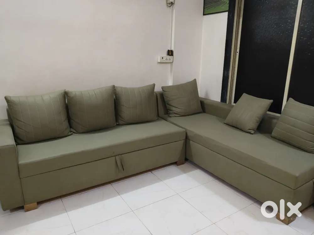 One year old L shape sofa