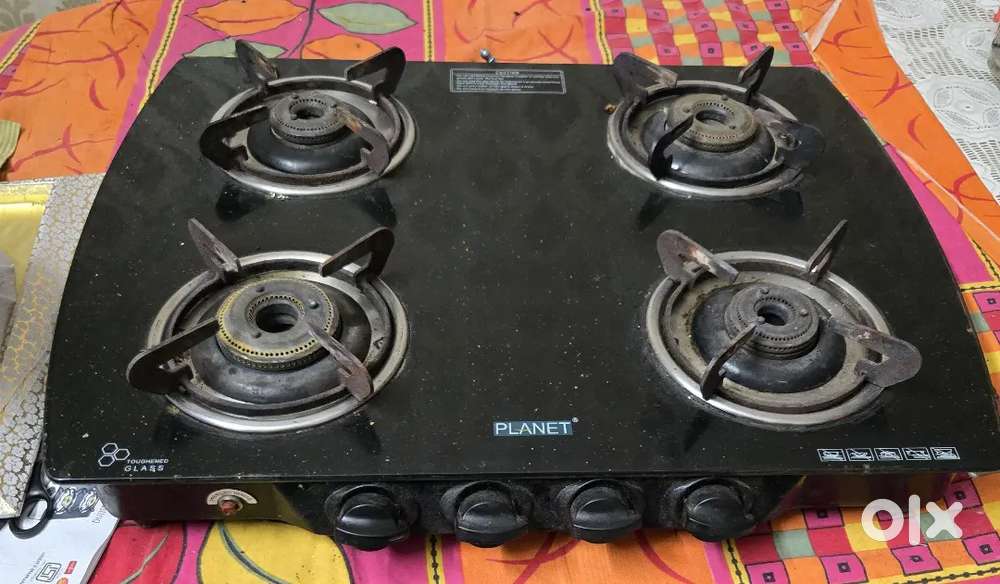 Planet Gas stove, Four Burners.