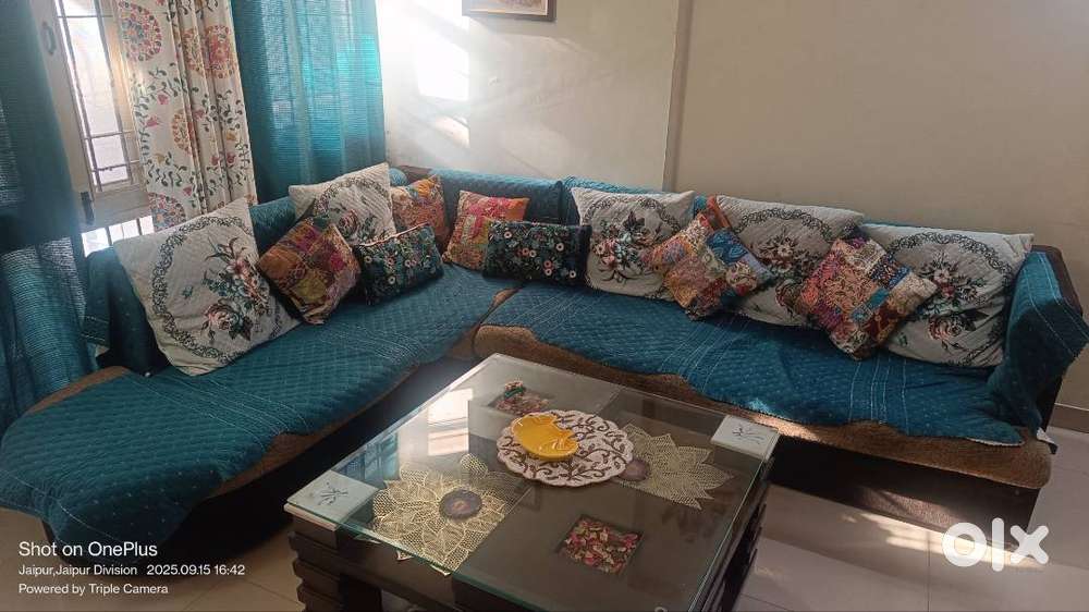 7 seater L type designer sofa with Cushions and attractive golden