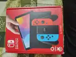 Nintendo Switch OLED red and blue (10 days old)