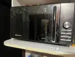 Bajaj microwave oven (in half price)