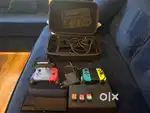 Nintendo Switch console with hames and kit bag
