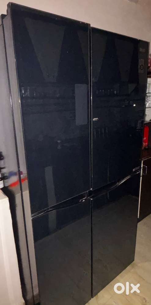 LG Side by side refrigerotor with black glass finish.