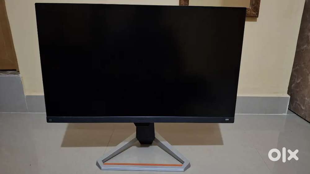 BenQ MOBIUZ Gaming monitor, Gaming keyboard with RGB, and 2 speakers.