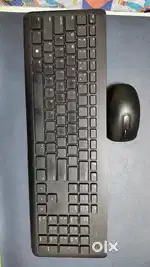 Dell 23 inch rotating monitor with keyboard and mouse.