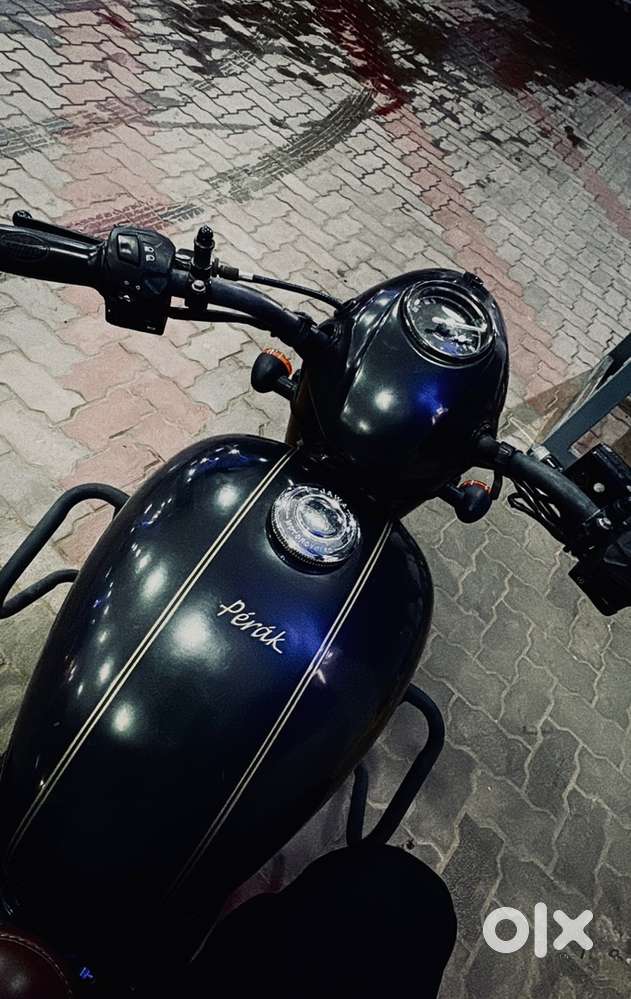 Dual channel ABS ,330 cc liquid cooled with heavy duty pillion seat.