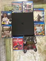 PS4 slim 1 TB, in immaculate condition with 2 original controllers.