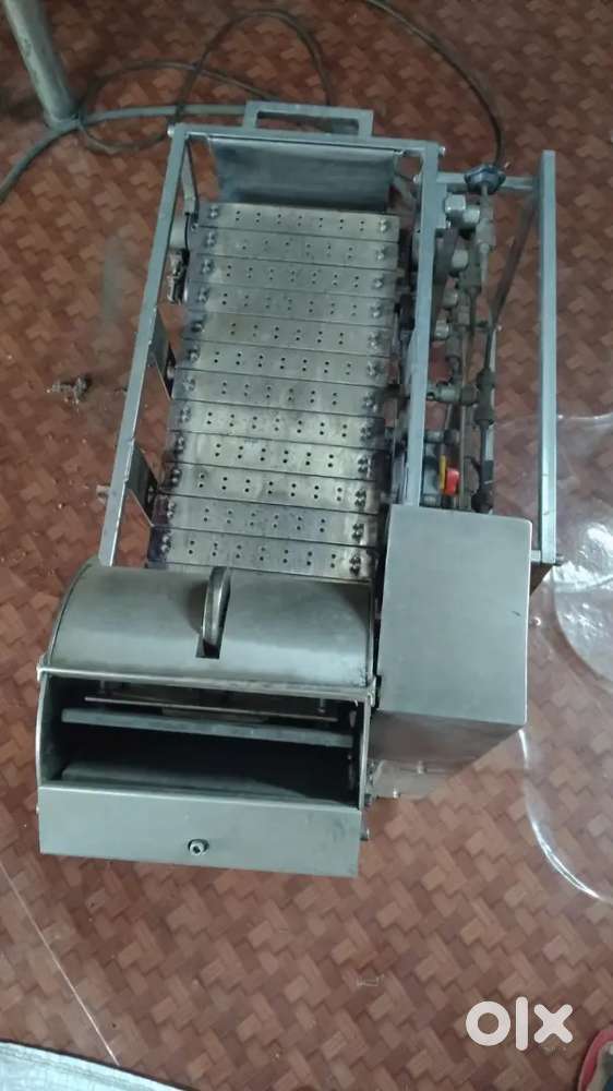 AUTOMATIC ROTI MAKING MACHINE
