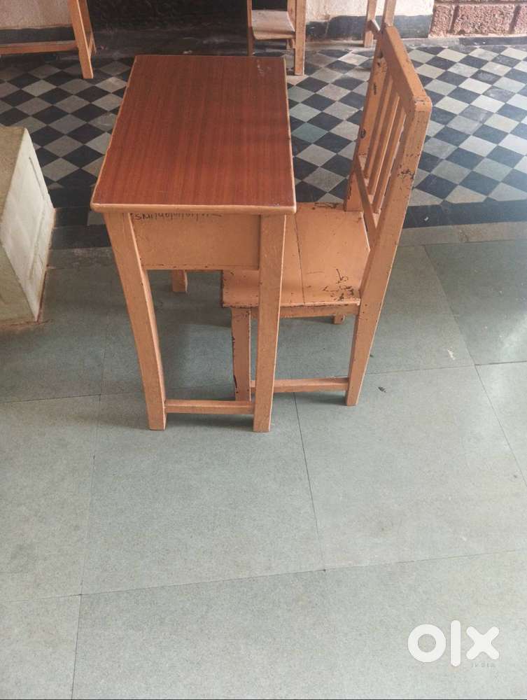 Wooden desk and chairs