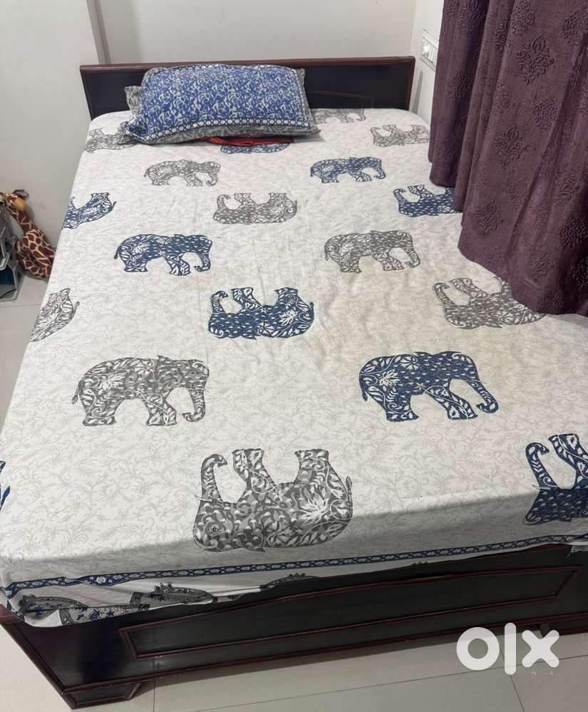 queen size  bed with storage underneath and  ortho 6 inch mattress