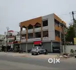 STAND ALONE BUILDING WITH 10 FLATS OWNED BY A SINGLE COMPANY.  GUARD