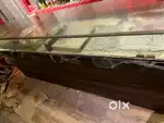 Shop counter with glass display partitions