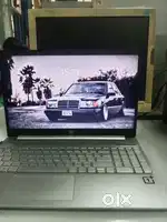 Hp laptop with oneplus stiker