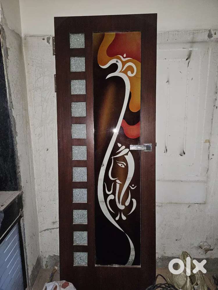 A seven-foot door featuring printed glass along with a matching window