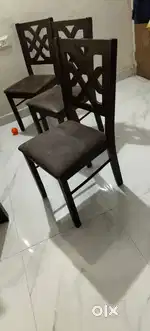 Selling dining table with 4 chair you can use for 6 chair as well