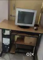 Computer with table and chair