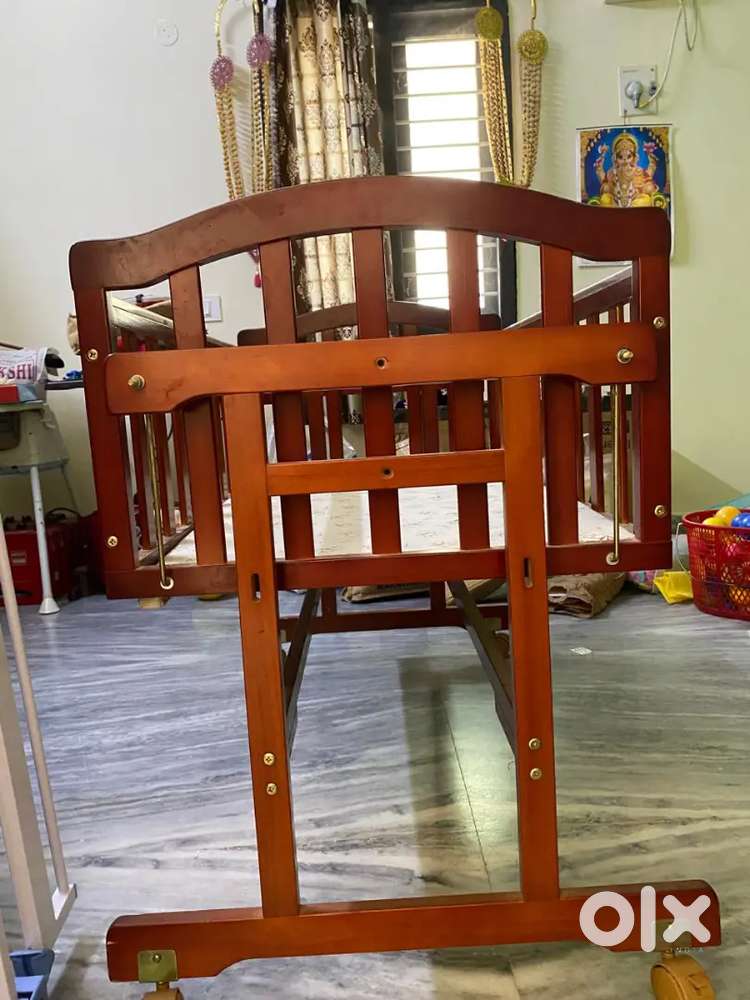 Babyhug wooden swing cradle