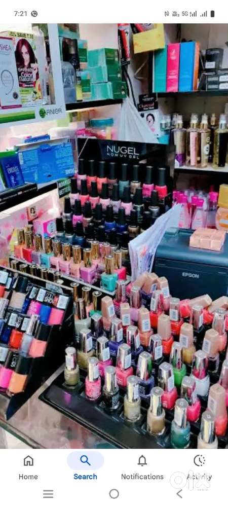 Cosmetic item , iron rack, and glass reck sell urgently for shop