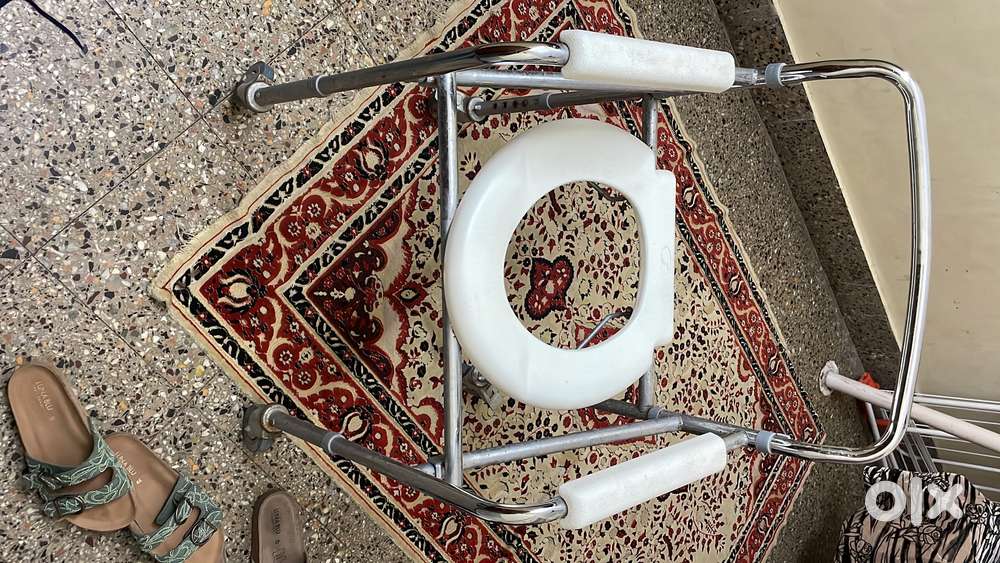 Bathroom wheelchair with commode
