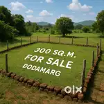 A beautiful NA Plot for sale is located on a hill in Dodamarg,