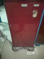 single-door refrigerator, likely an older model given its appeara