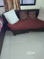 3 seater sofa with one round sofa and cushions