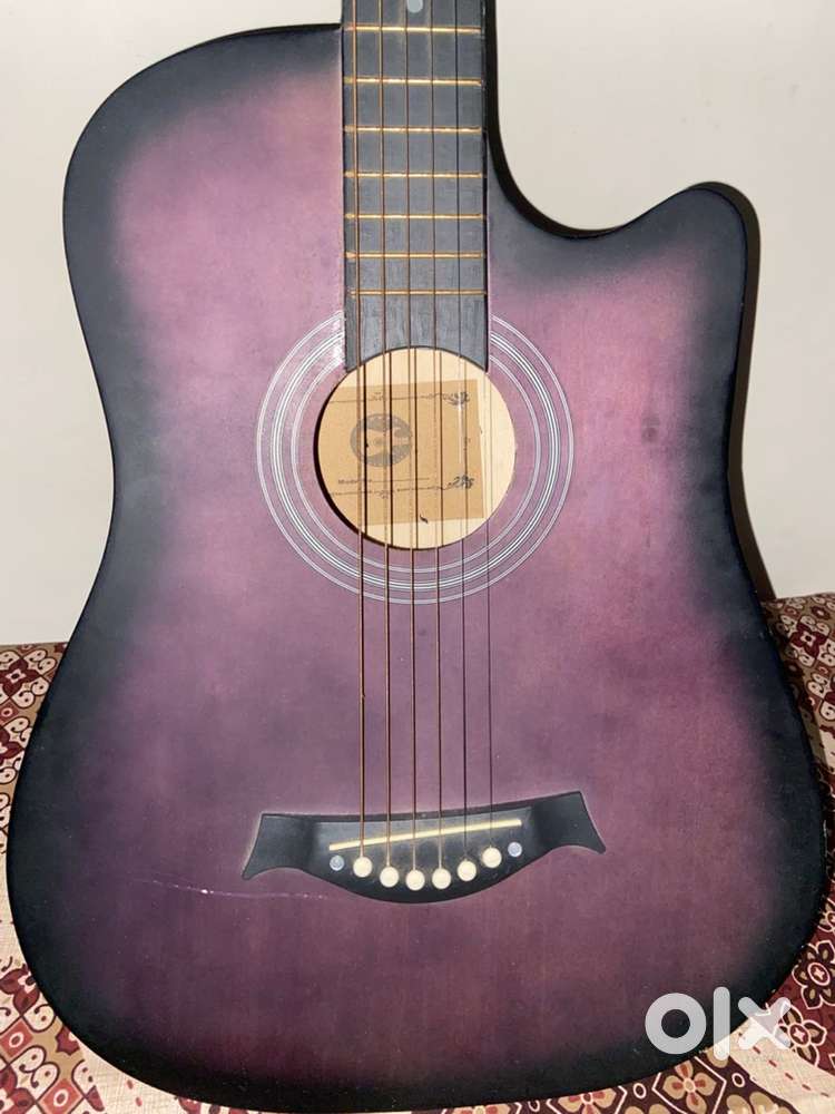 Guitar purple colour , pixi with bag