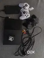 Ps2 slim for sale with 30+ games