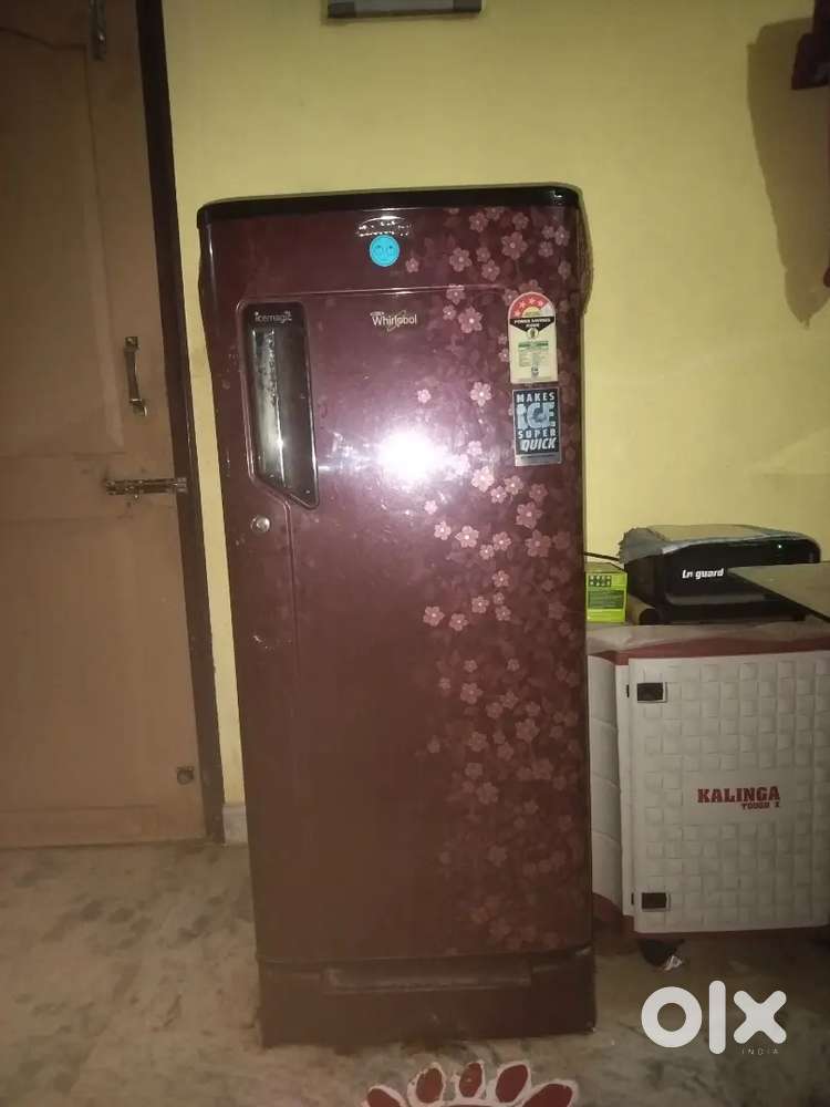 Red colour fridge with good condition