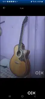 Acoustic guitar with accessories