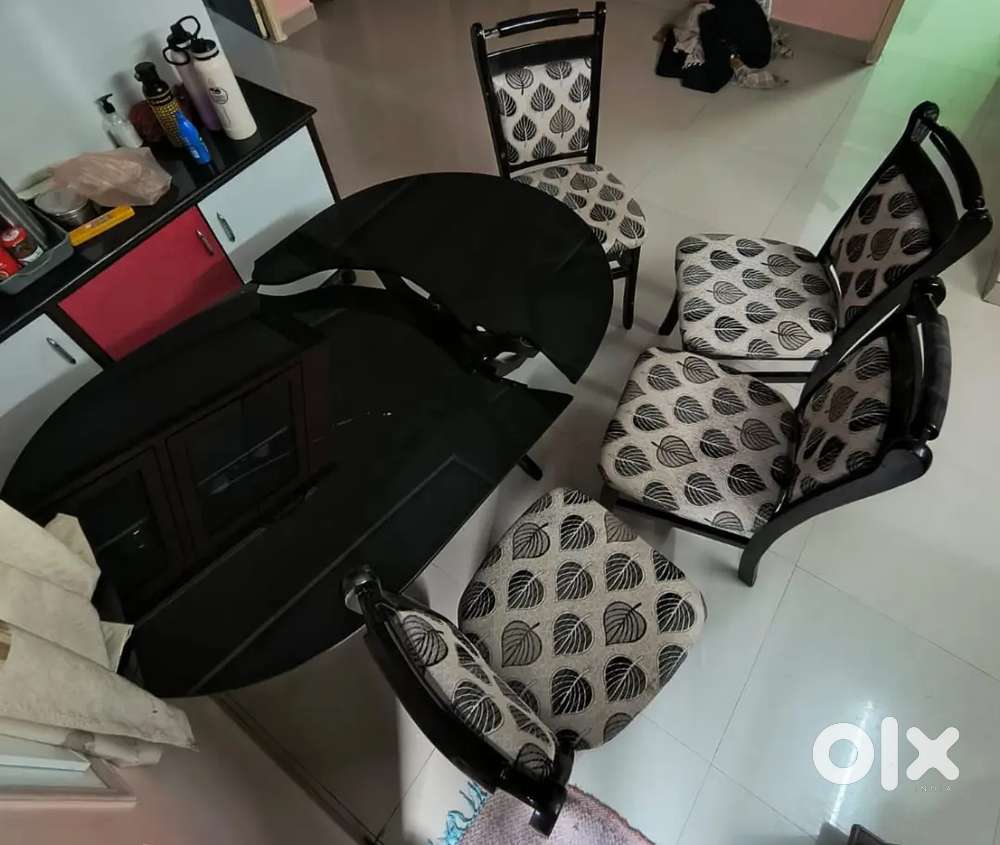 Wooden Dining table with glass top and 4 chairs