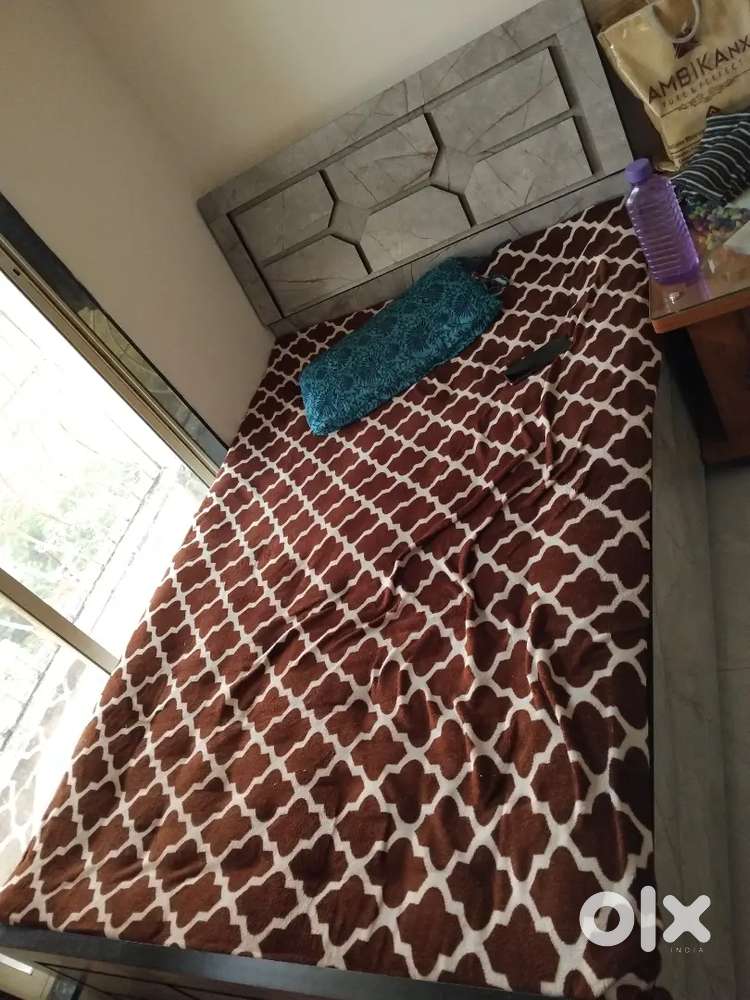 Good condition wooden bed