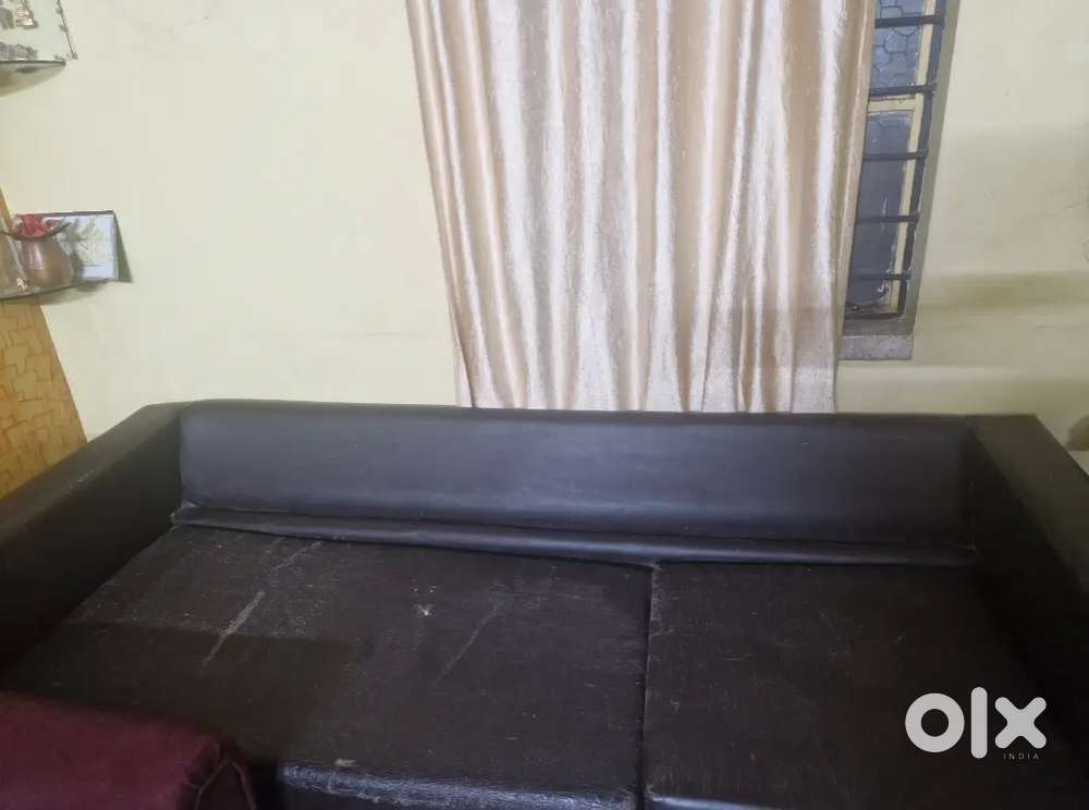 3 seater black colored sofa