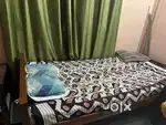 Bed, almirah, fan, wardrobe, wooden rack, office chair, table, cycle