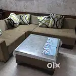 Seven seater sofa with centre table and two settis